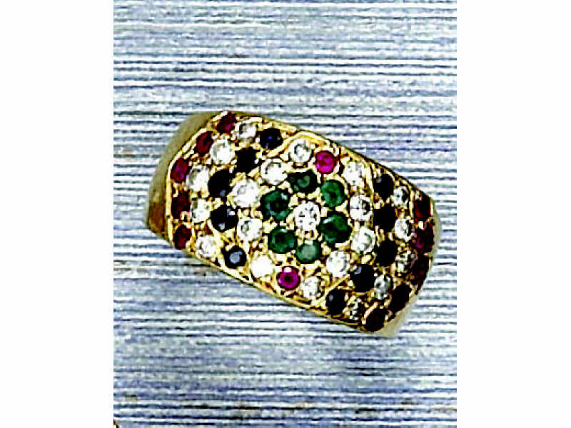 Appraisal: GEMSTONE RING k yellow gold lady's ring set with twenty-one