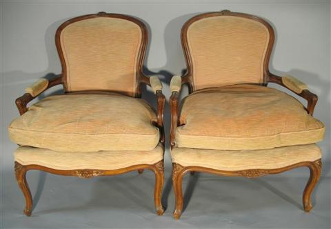 Appraisal: PAIR OF LOUIS XV STYLE FAUTEUILS the central carved crest