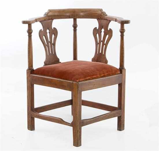 Appraisal: George III elm corner chair late th century curved crest