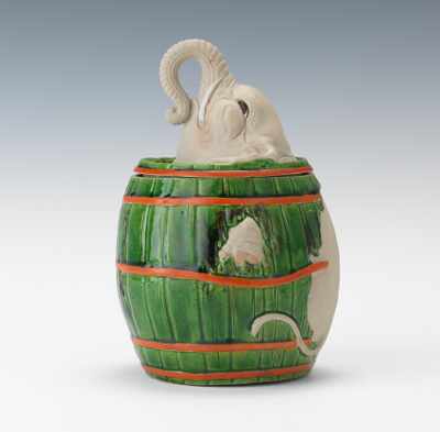 Appraisal: A Porcelain Elephant in Barrel Humidor Gray porcelain tobacco jar