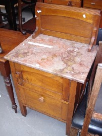 Appraisal: An early th century marble topped wash stand in cedar