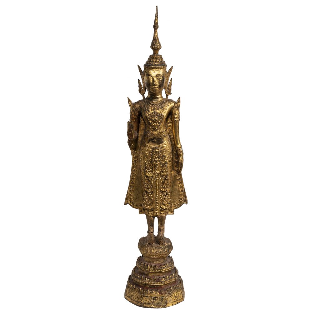 Appraisal: THAI GILT METAL BUDDHAAtop a lotus stand on a -tiered