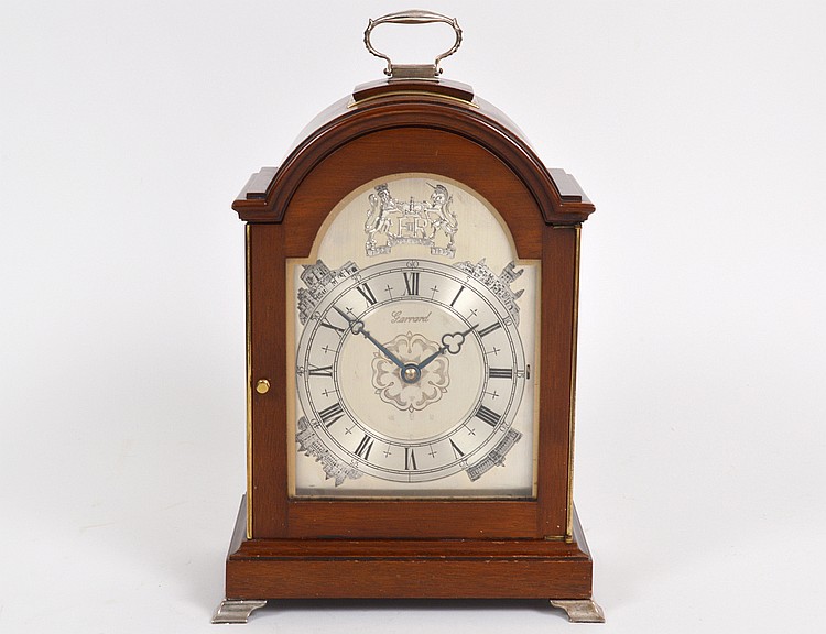 Appraisal: ENGLISH SILVER MOUNTED MAHOGANY MUSICAL MANTLE CLOCKRetailed and commissioned by