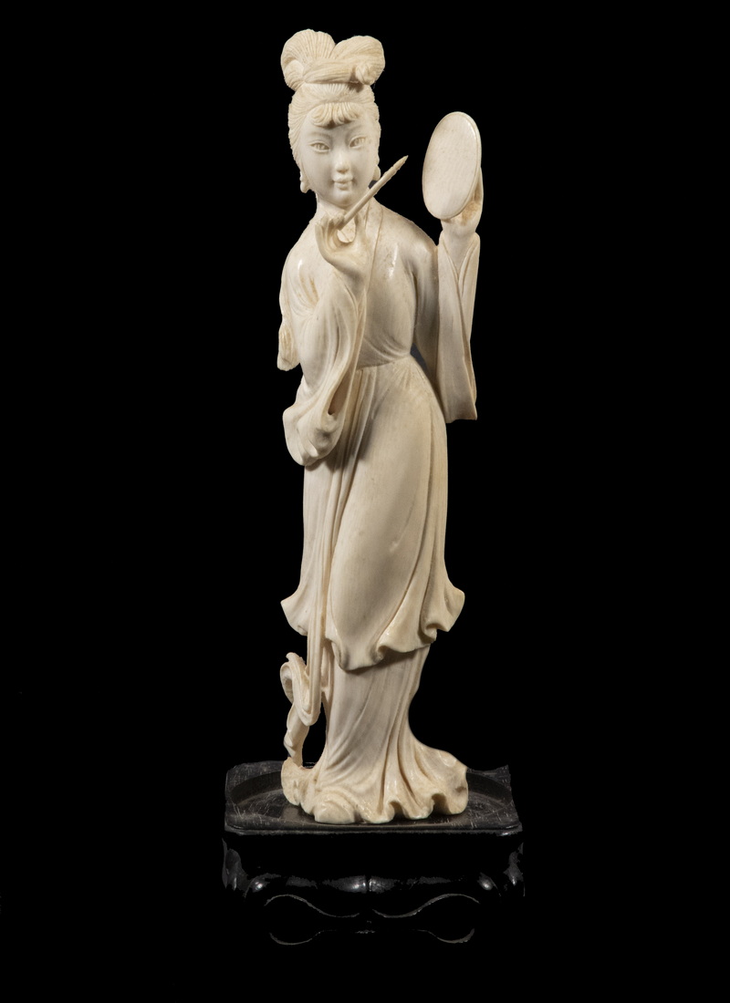 Appraisal: TH C CHINESE IVORY FIGURINE ON WOODEN STAND Portrait of