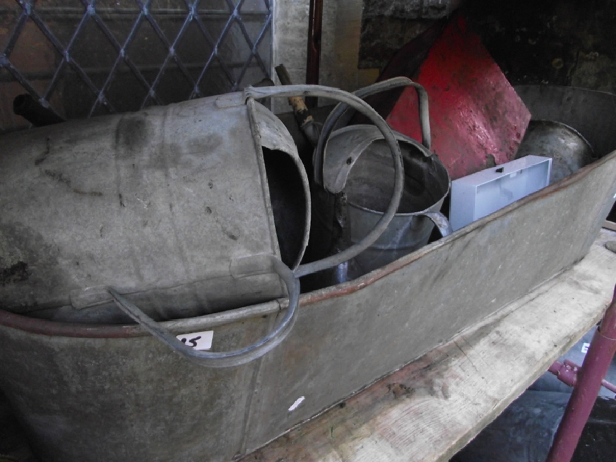 Appraisal: A vintage galvanised steel bath of tapered form together with