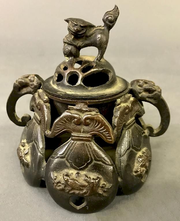 Appraisal: Asian Bronze Covered Censer Asian bronze covered censer with Foo