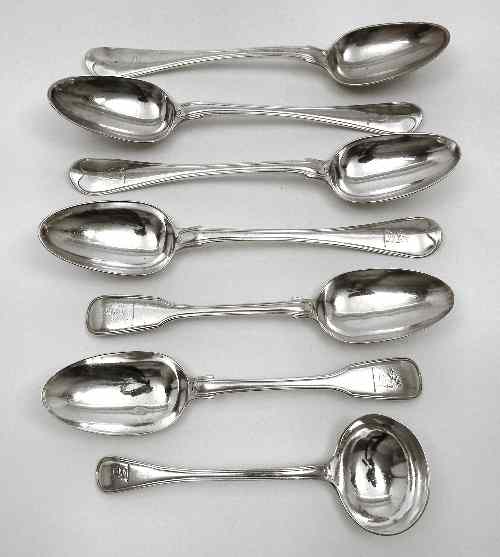 Appraisal: Four George III silver table spoons with moulded handles by