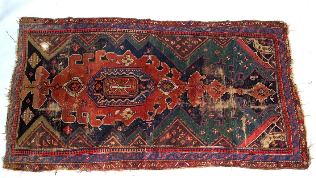 Appraisal: th CENTURY NORTH-WEST PERSIAN TRIBAL GALLERY CARPET woven in shades