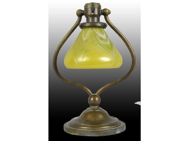 Appraisal: Bradley Hubbard Lamp Base and Loetz Type Shade Description Lemon