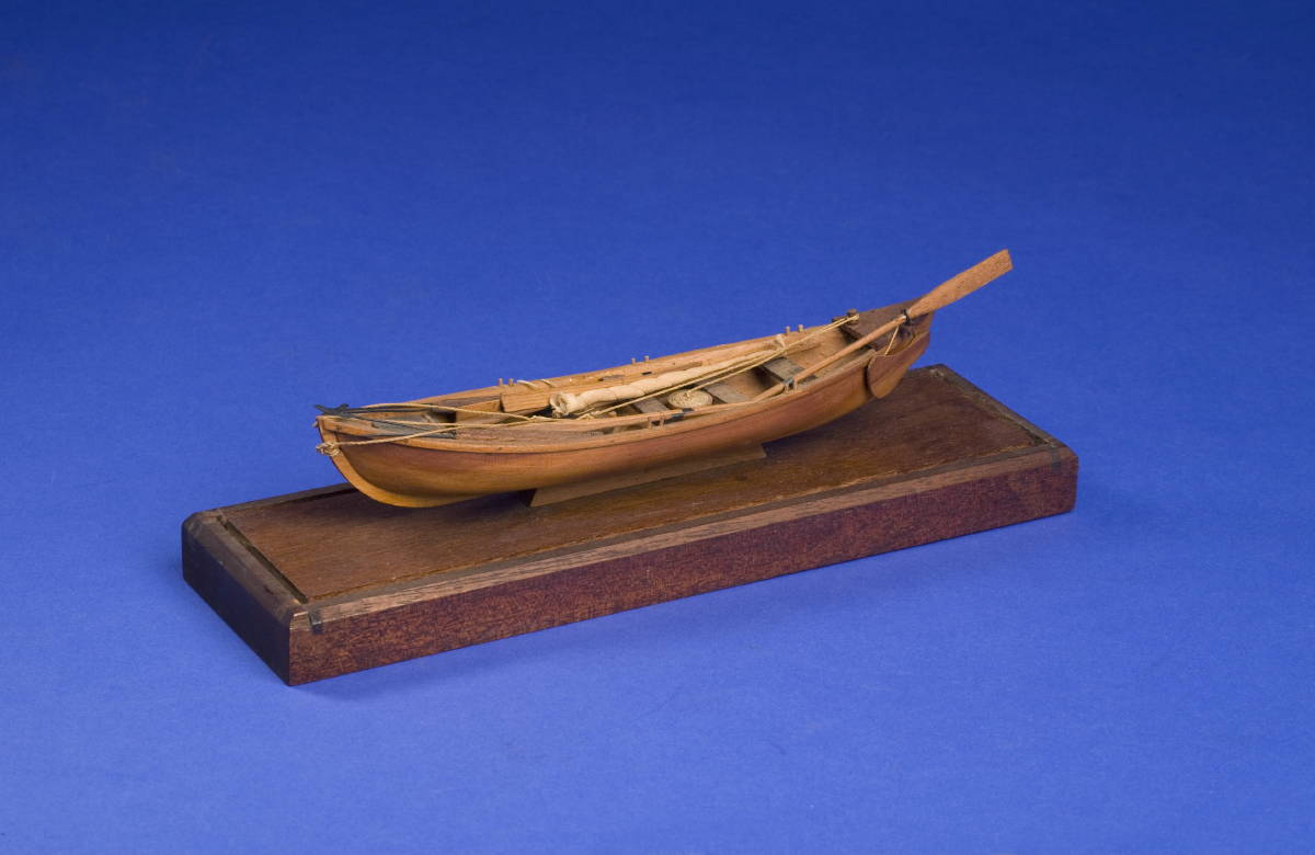 Appraisal: CASED WOOD MODEL OF A WHALEBOAT Complete with oars harpoons