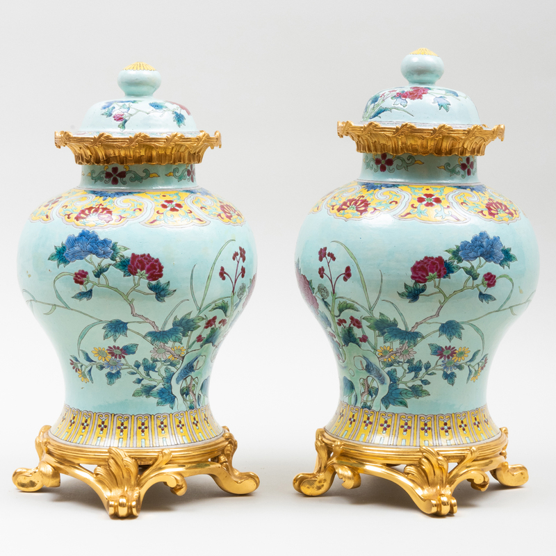 Appraisal: PAIR OF GILT-METAL-MOUNTED CHINESE PORCELAIN JARS AND COVERS Unmarked x