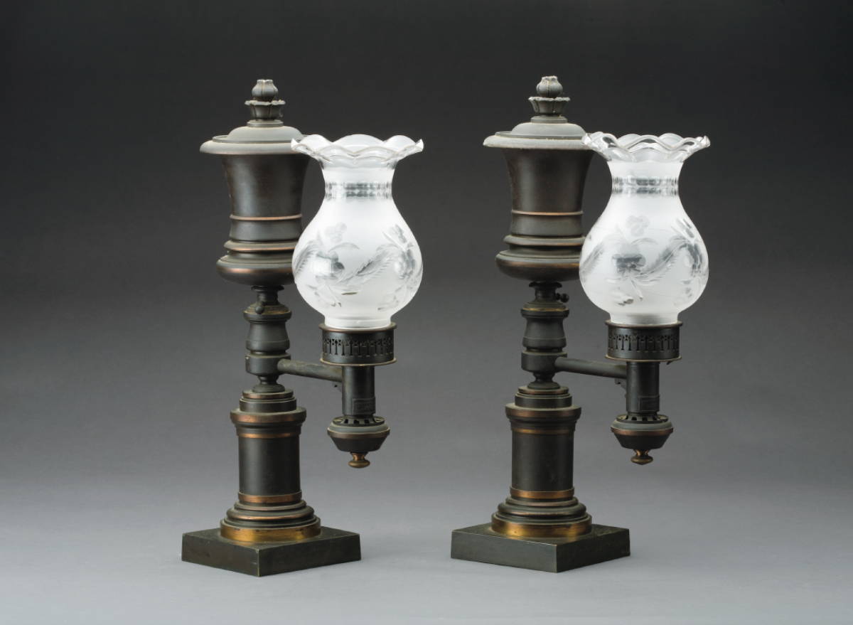 Appraisal: PAIR OF PATINATED-BRONZE SINGLE-ARM ARGAND LAMPS WITH ENGRAVED SHADES LABEL