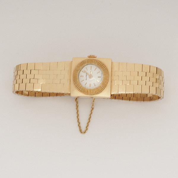 Appraisal: LADIES BRACELET WATCH k yg Swiss jeweled mvt by Buren