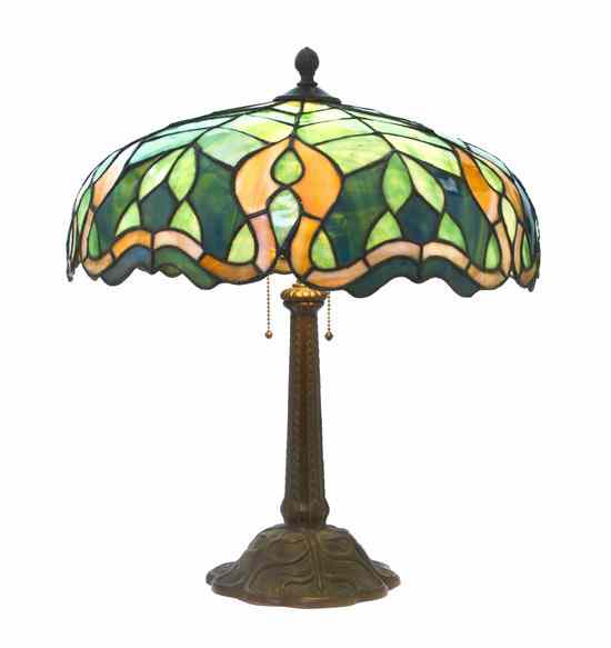 Appraisal: An American Leaded Glass Lamp the domed geometric shade having