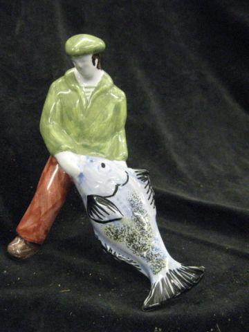 Appraisal: Henriot Quimper French Pottery Figurine man fish excellent