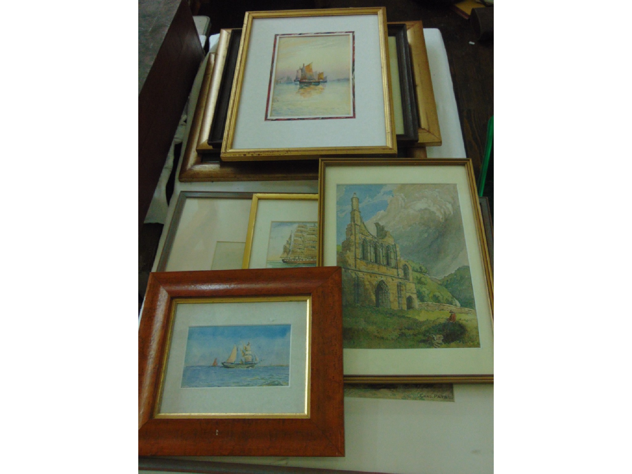 Appraisal: A collection of watercolours including a mountainous landscape with cattle