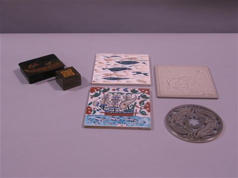 Appraisal: GROUP OF TRIVETS AND BOXES Comprising a Russian painted wood