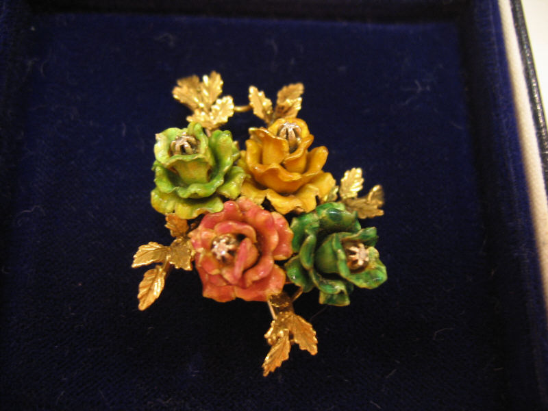 Appraisal: ENAMEL BROOCH k yellow gold with pink green and gold