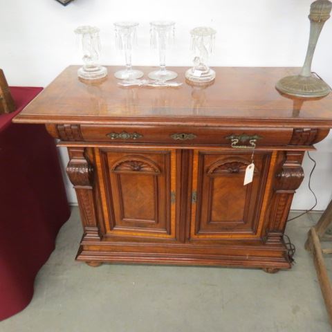 Appraisal: Carved Wooden Cabinet single drawer over double doors tall wide