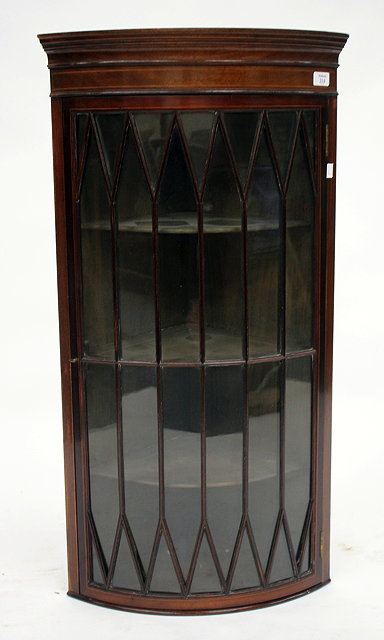 Appraisal: AN EDWARDIAN MAHOGANY AND STRING INLAID HANGING CORNER CABINET of