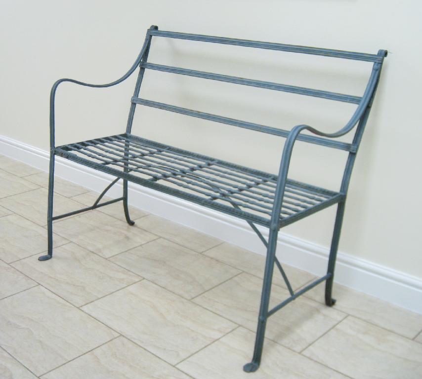 Appraisal: A Regency wrought iron Garden Bench with reeded frame and