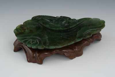 Appraisal: A Spinach Jade Carved Dish Chinese Lily pad with frog