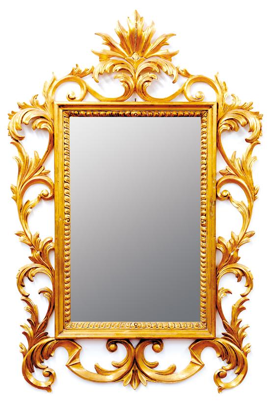 Appraisal: Chippendale style gilded mirror molded frame surrounded by open rococo-style