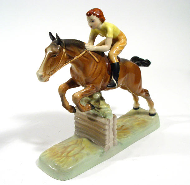 Appraisal: Large hand painted Beswick female jockey on horseback jumping a