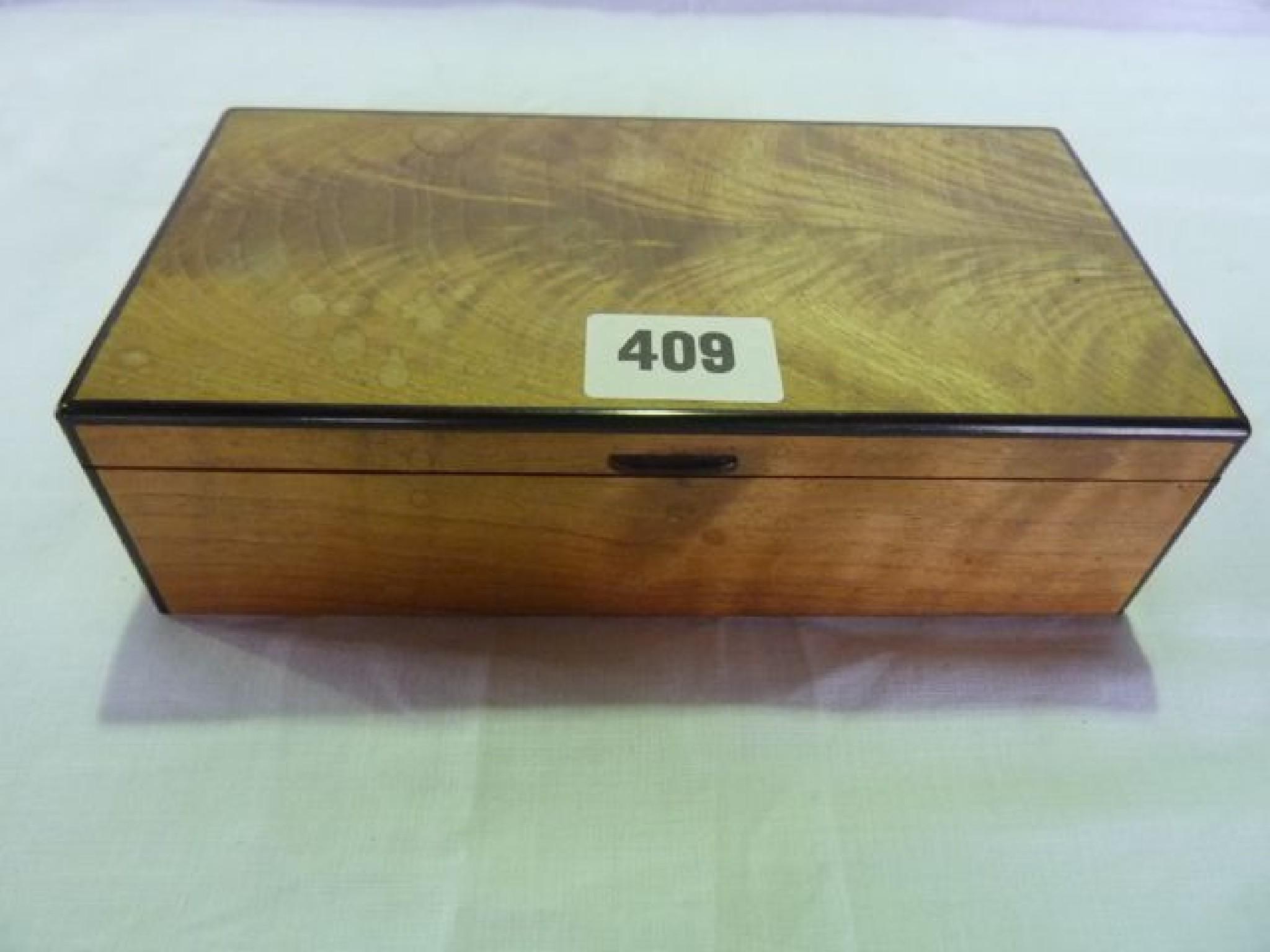 Appraisal: A Cotswold School box in English walnut with ebony banded