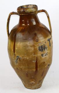 Appraisal: Glazed terra cotta olive jar Glazed terra cotta olive jar