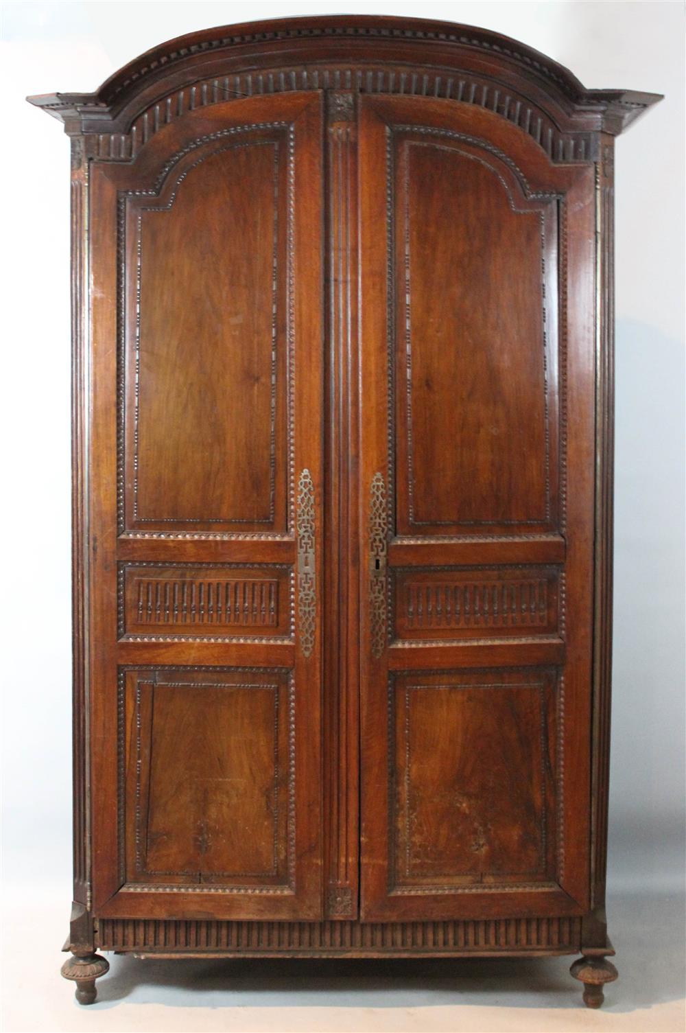 Appraisal: LOUIS XVI MAHOGANY ARMOIRE th Century having an arched and