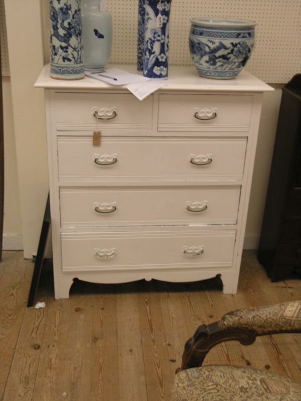 Appraisal: A late Victorian white painted chest two short and three