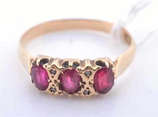 Appraisal: A GARNET TOPPED DOUBLET AND DIAMOND HALF HOOP RING STAMPED