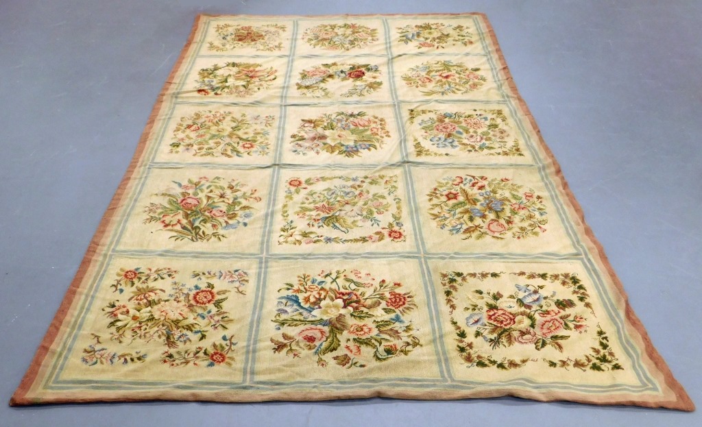 Appraisal: EUROPEAN FLORAL NEEDLEPOINT RUG Europe Early th Century Fifteen squares