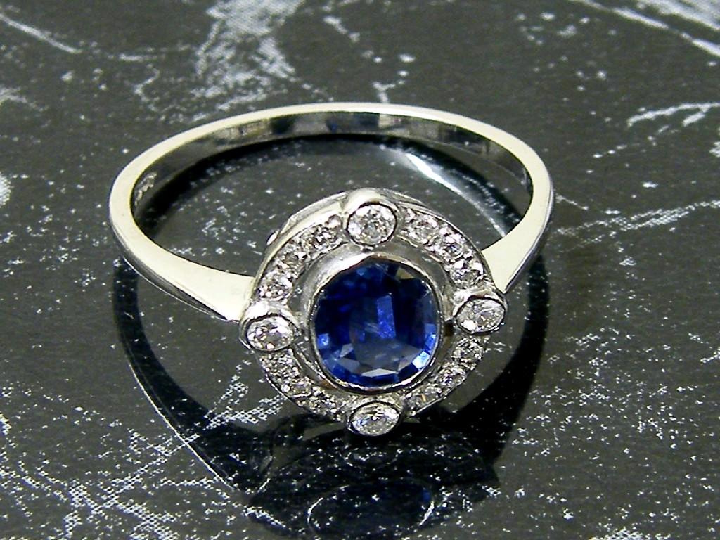 Appraisal: Fine ct white gold tanzanite and diamond cluster ring with