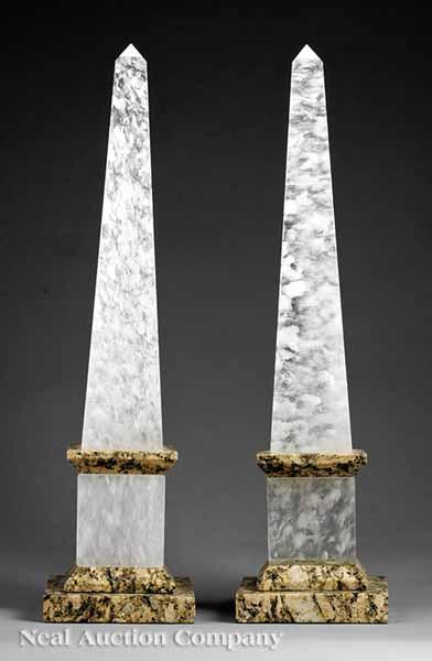 Appraisal: A Pair of Rock Crystal Obelisks set on rectangular conforming