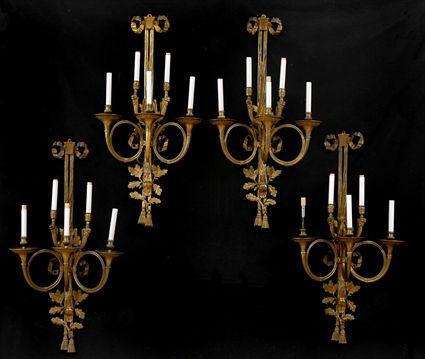 Appraisal: SET OF FOUR LOUIS XVI-STYLE GILT-METAL FIVE-LIGHT WALL APPLIQUES Each