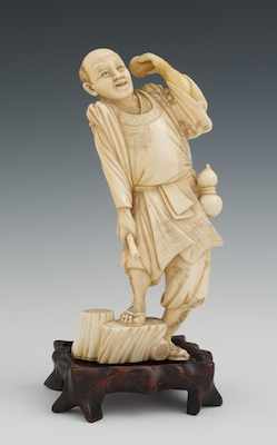 Appraisal: A Chinese Carved Ivory Figure of a Man with a