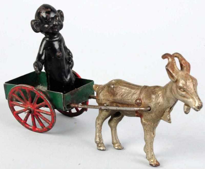 Appraisal: Cast Iron Tin Goat-Drawn Yellow Kid Toy Goat pulls cart