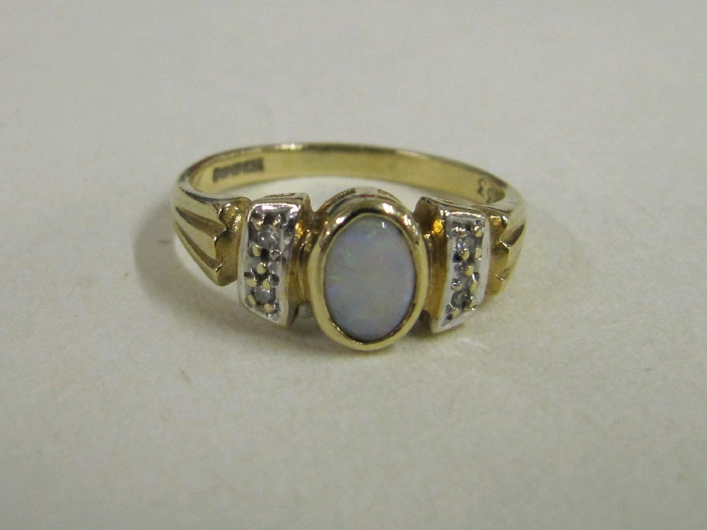 Appraisal: Gold opal and diamond set dress ring