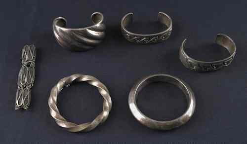 Appraisal: Group of Navajo and Mexican silver cuffs and bracelets six