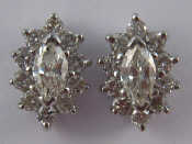 Appraisal: A pair of white metal tests carat gold marquise and