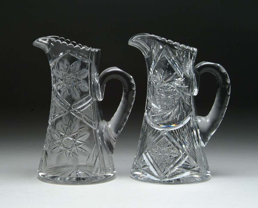 Appraisal: TWO CUT GLASS PITCHERS Lot consists of two cut glass