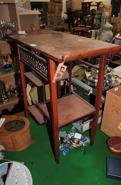 Appraisal: A JAPANESE HARDWOOD SIDE TABLE with three undertiers and a