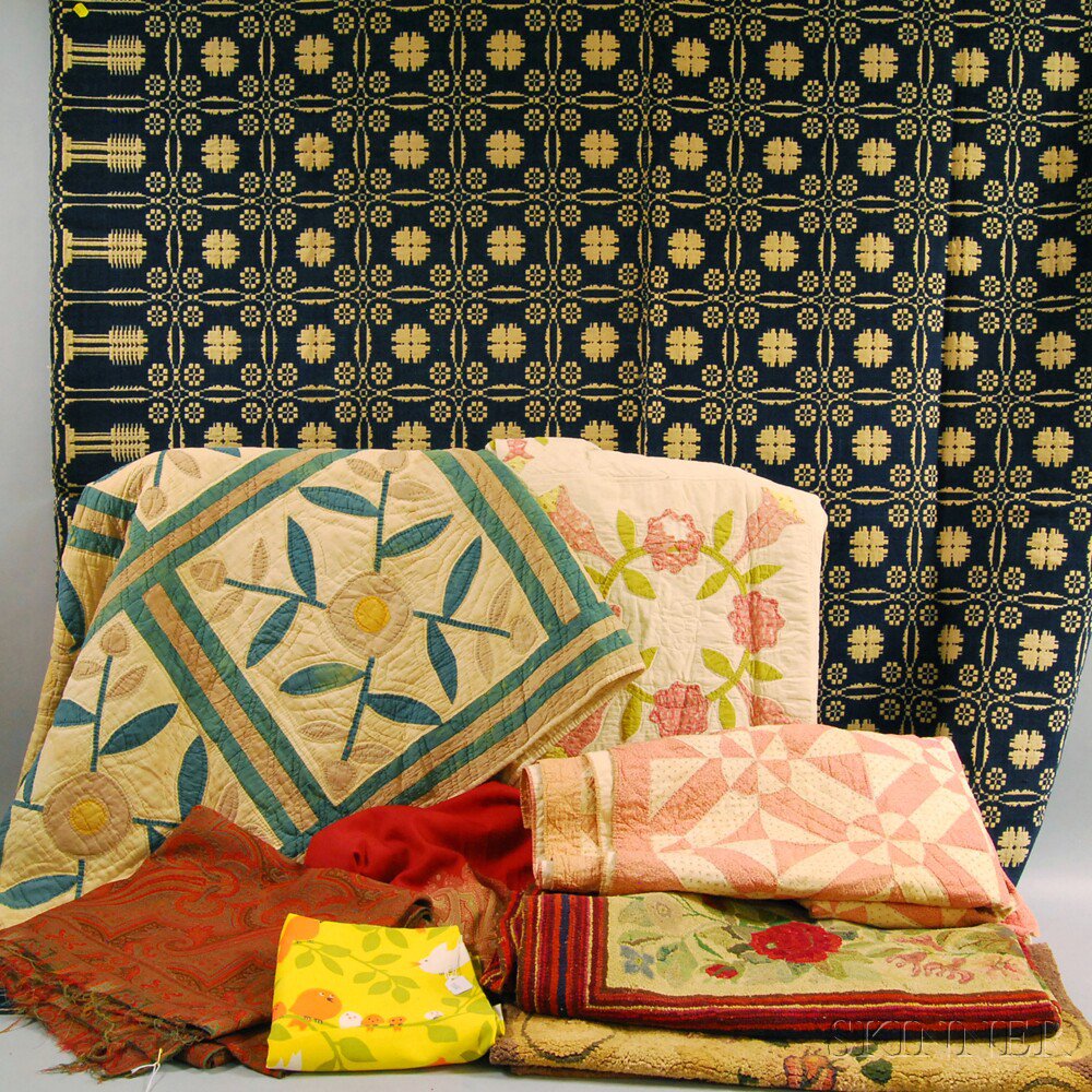 Appraisal: Group of Textiles two pieced cotton quilts with floral medallions