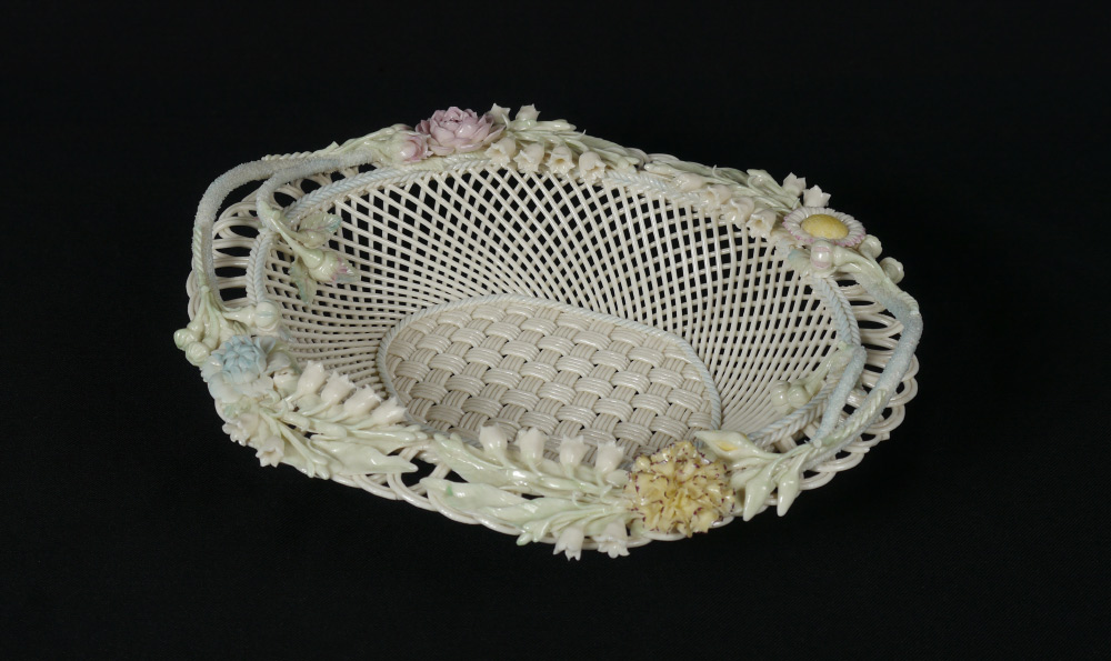 Appraisal: BELLEEK PORCELAIN BOSTON BASKET A large strand woven basket with