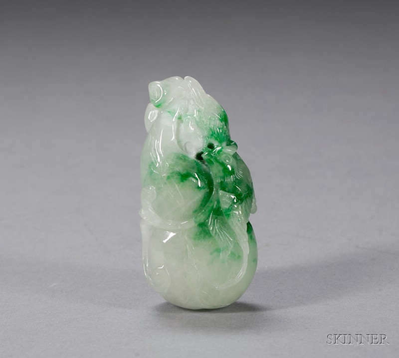 Appraisal: Jade Carving China th century green stone with emerald areas