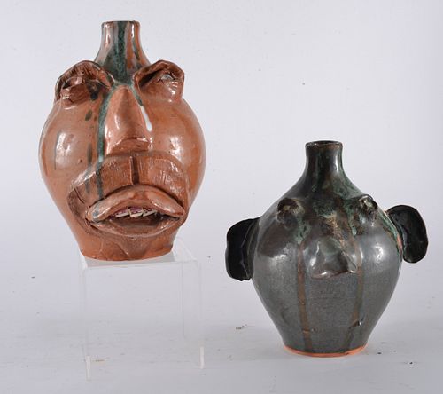 Appraisal: RON CAUSEY JR PAIR OF FACE JUGSpottery face jugs signed