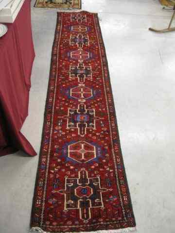 Appraisal: Heriz Persian Handmade Runner geometricdesigns red field ' x '