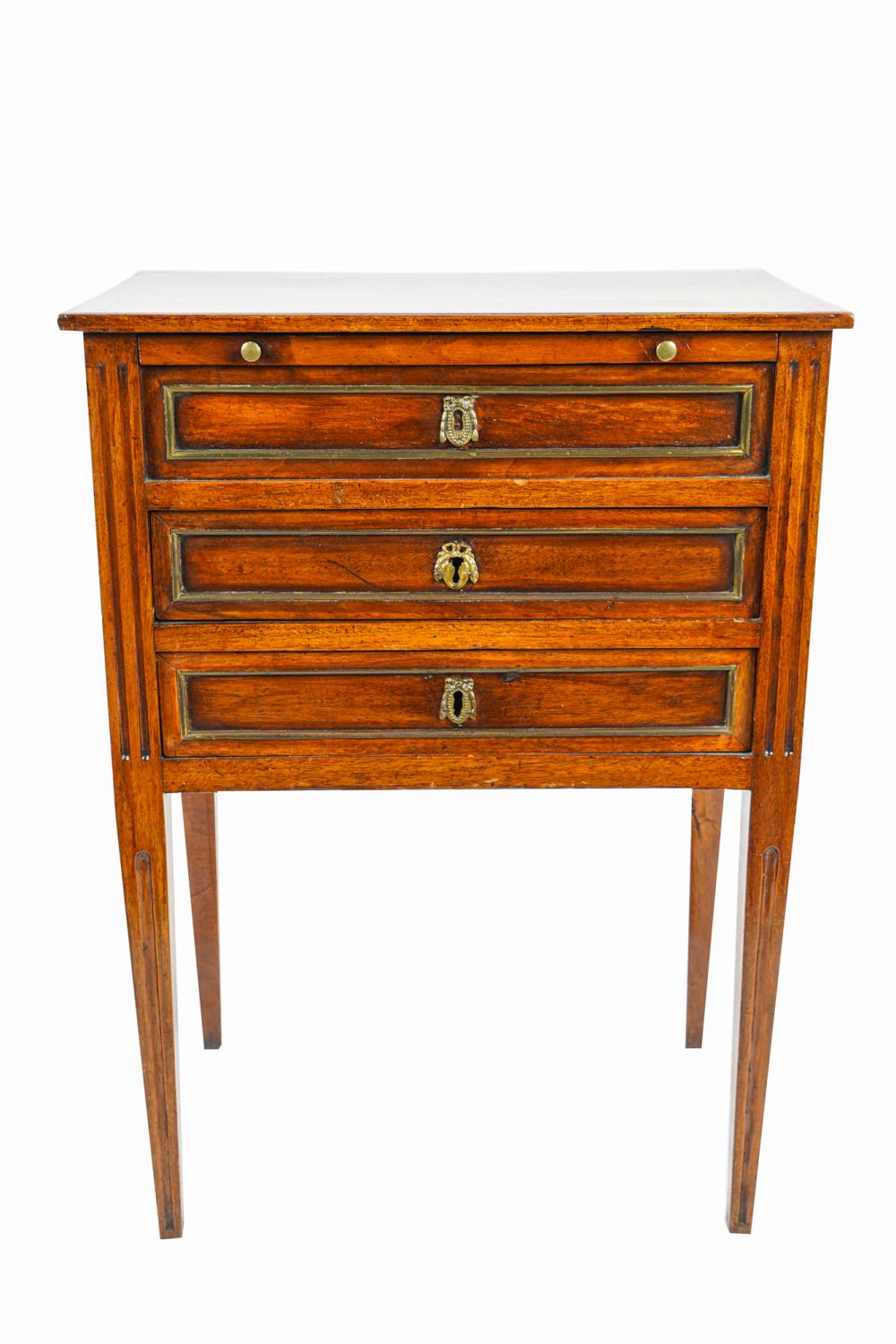 Appraisal: FRENCH WALNUT THREE DRAWER COMMODEwith brass lining to front drawers